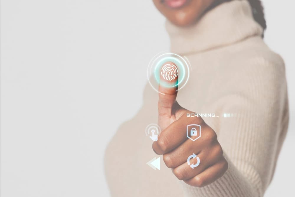 woman scanning fingerprint to unlock futuristic interface